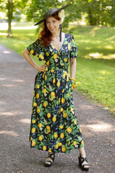 A lovely lady wearing a Lemon Maxi Wrap Dress