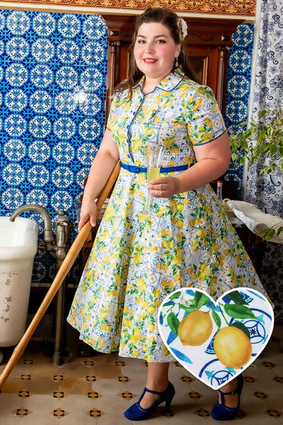 A model in Mabel Mediterranean Lemon Midi Shirt Dress In White