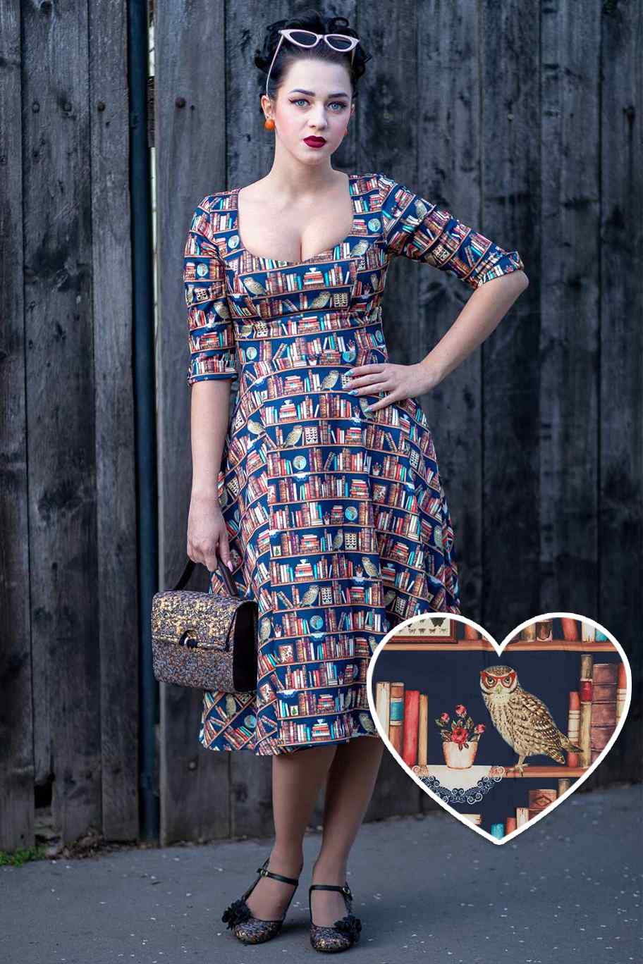 A lady wearing a Library Book Mid Calf Dress