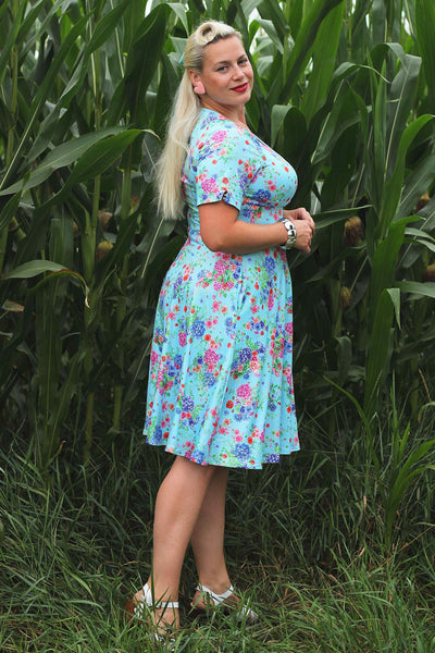 A model wearing a Light Blue Hydrangea Dress