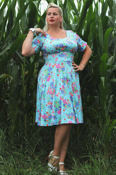 A model wearing a Light Blue Hydrangea Dress