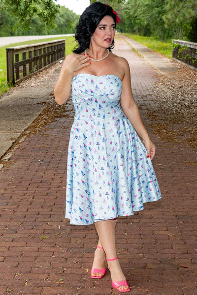 A model wearing Light Blue Nautical Sailboat Strapless Dress