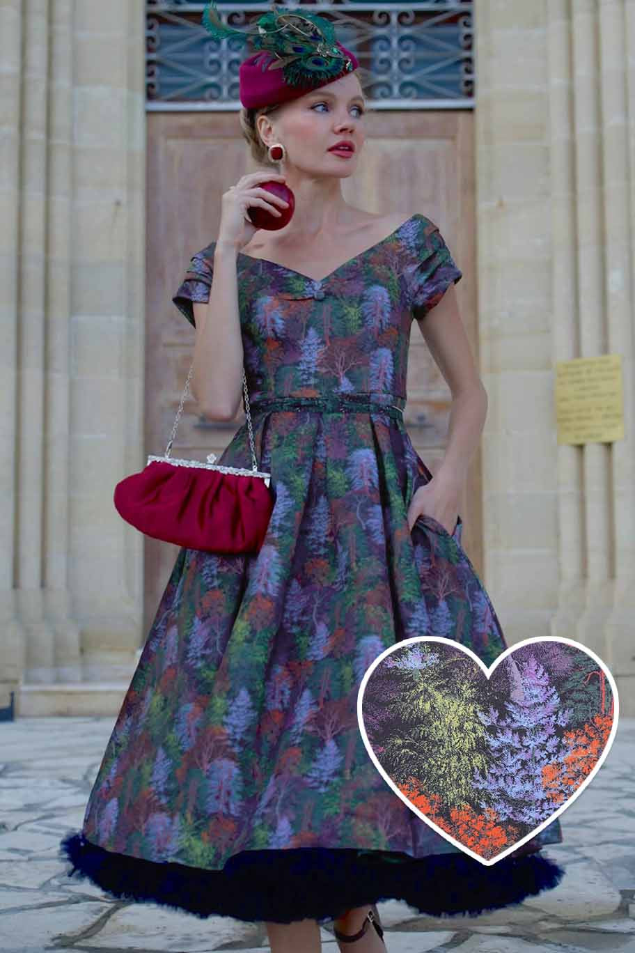 A model wearing a Lily Autumn Foliage Off Shoulder Dress