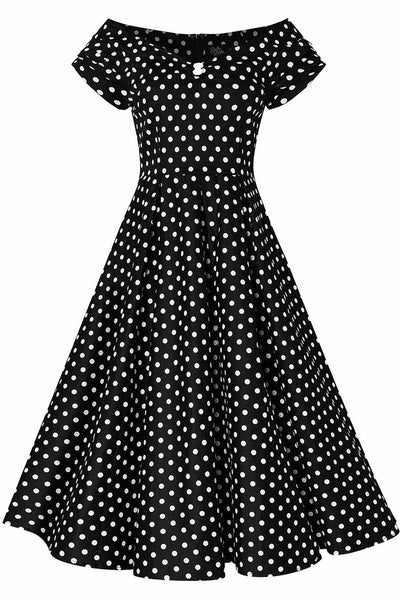 Front view of Lily Black Swing Dress With White Polka Dots