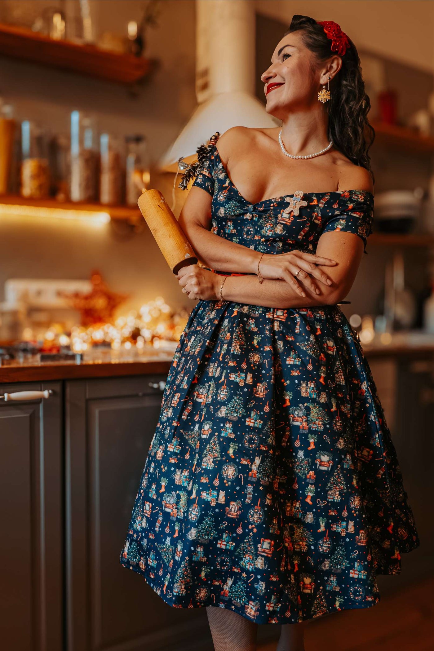 A woman wearing a Lily Cats At Christmas Circle Dress