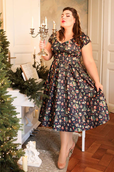 A model wearing a Lily Cats At Christmas Circle Dress