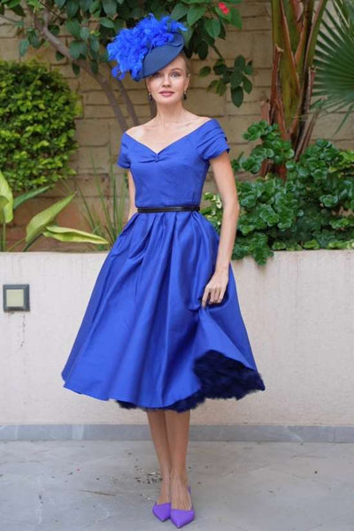 A lovely lady wearing a Lily Dark Blue Off Shoulder Dress