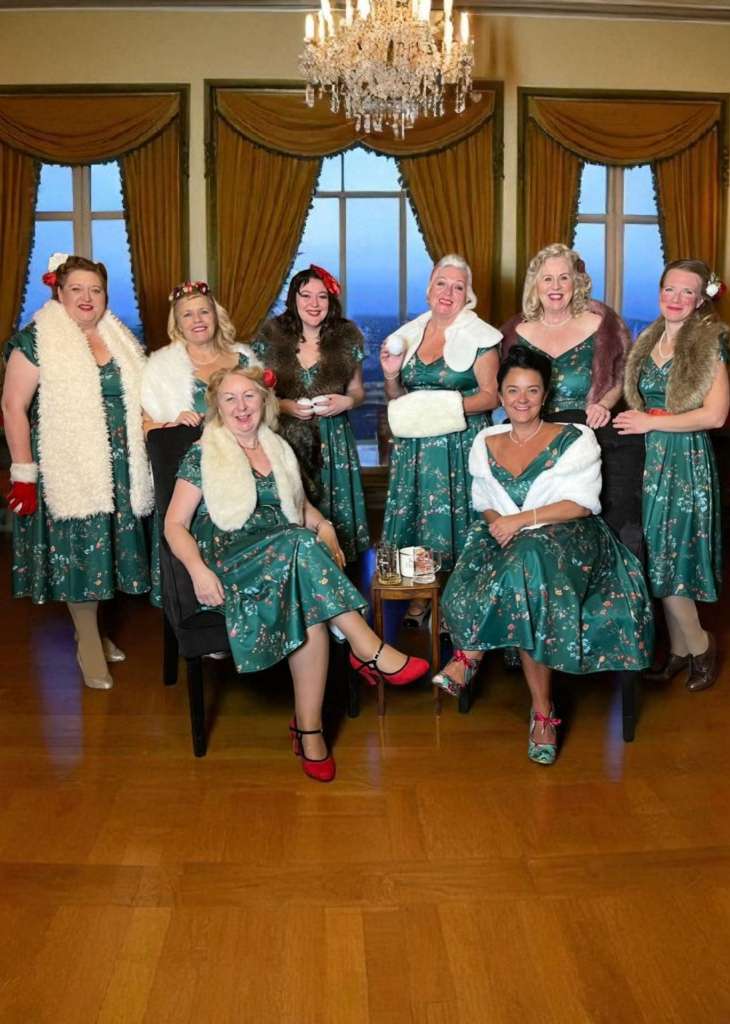 Ladies wearing the Lily Green Bird Forest Off Shoulder Swing Dress