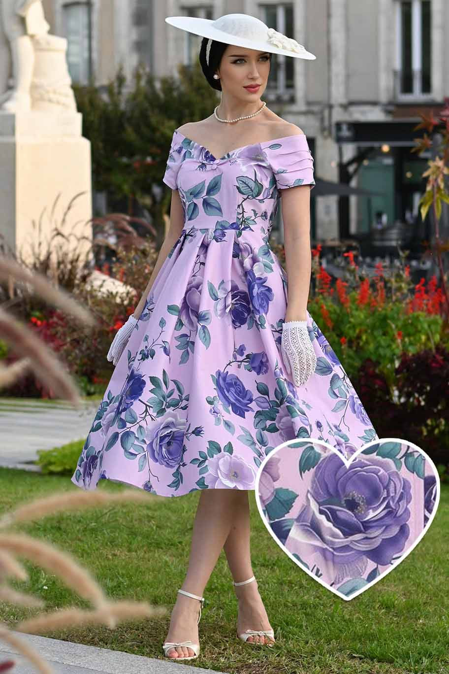 A lady wearing a Lily Purple Rose Off Shoulder Midi Dress