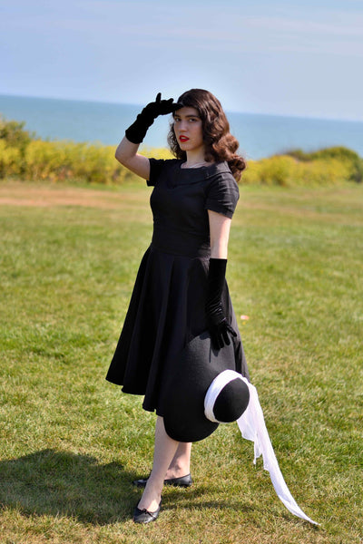 A lady wearing a Little Black Dress
