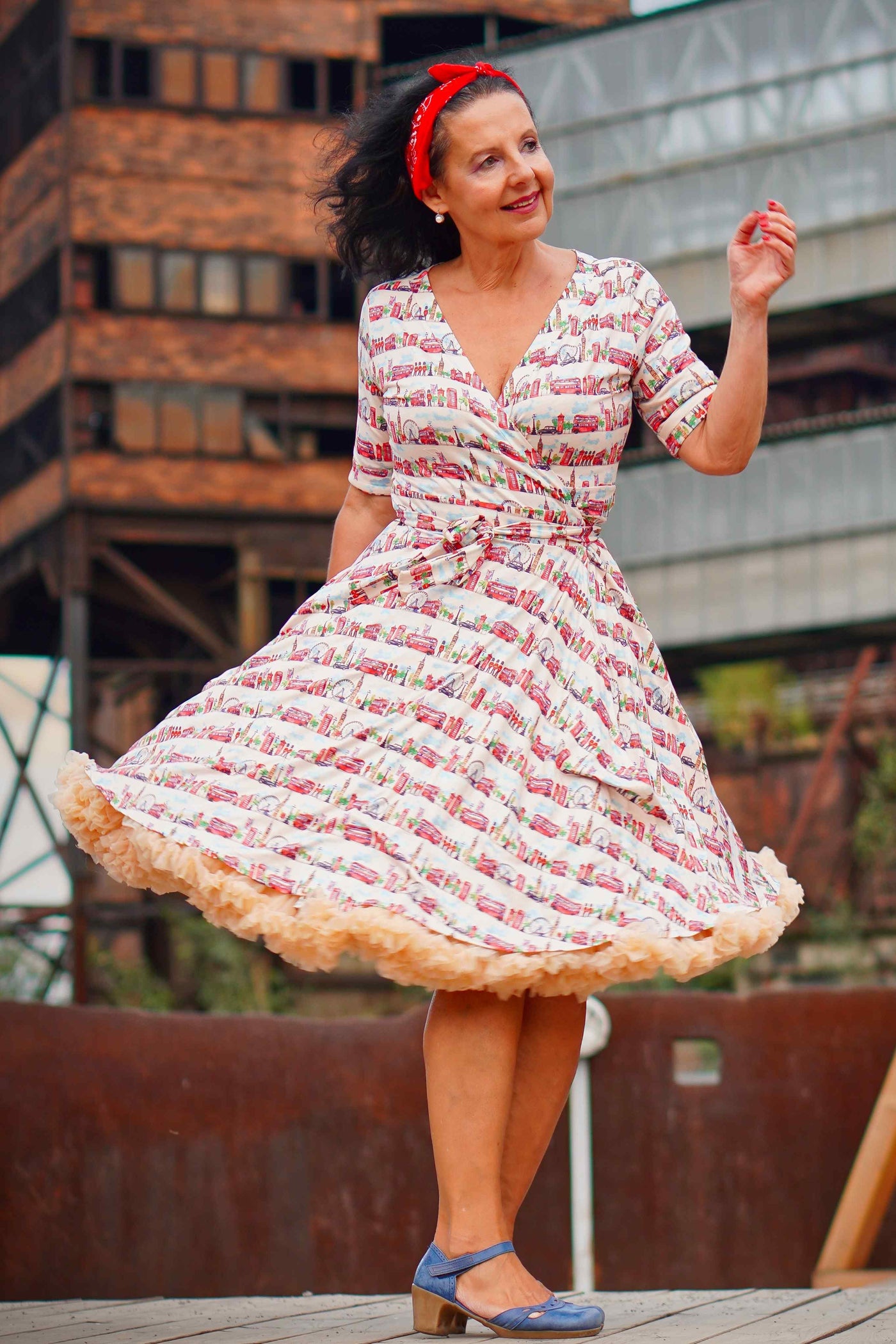 A lovely model wearing a Matilda London Print Wrap Dress