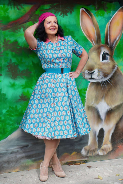A lovely lady wearing a Mabel Baby Deer Midi Shirt Dress In Blue