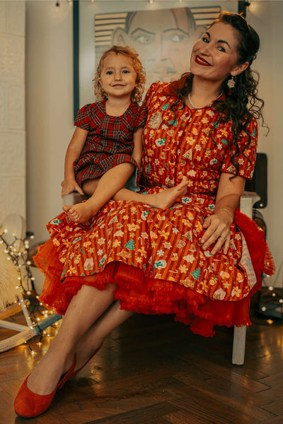 A lovely model wearing a Mabel Christmas Gingerbread Cookie Shirt Dress