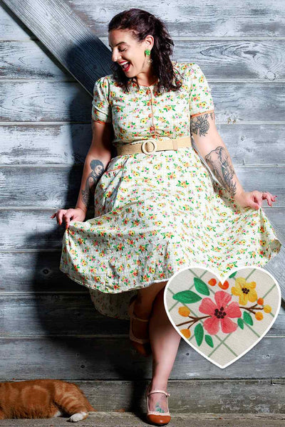 A model wearing a Mabel Retro Floral Midi Shirt Dress