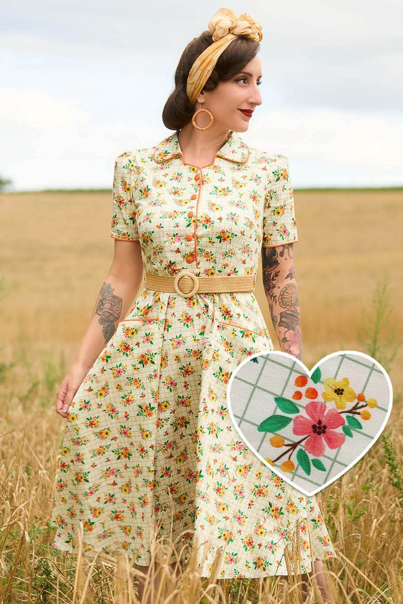 A model wearing a Mabel Retro Floral Midi Shirt Dress