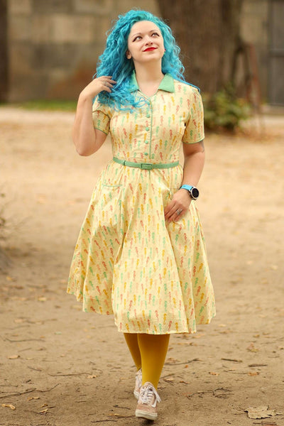 A girl wearing a Mabel Seahorse Midi Shirt Dress