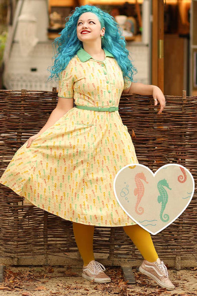 A lady wearing a Mabel Seahorse Midi Shirt Dress