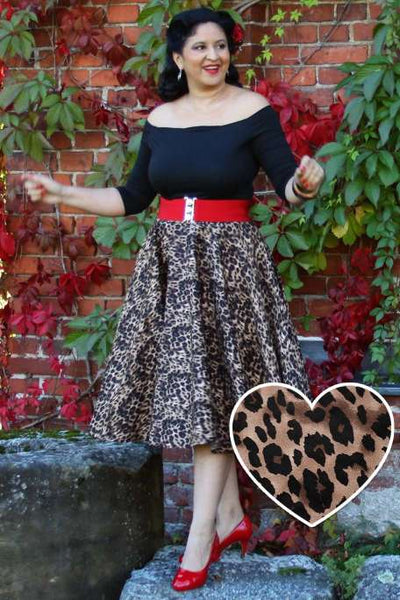 A lovely model wearing a Maisie Leopard Print Full Circle Midi Skirt