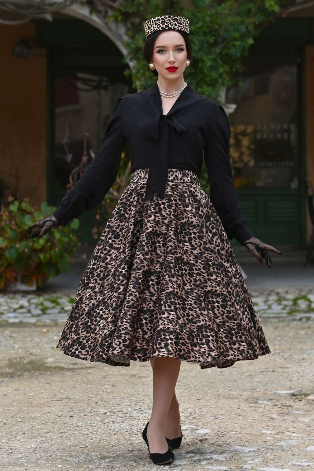 A model wearing a Maisie Leopard Print Full Circle Midi Skirt