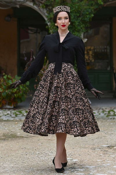 A model wearing a Maisie Leopard Print Full Circle Midi Skirt
