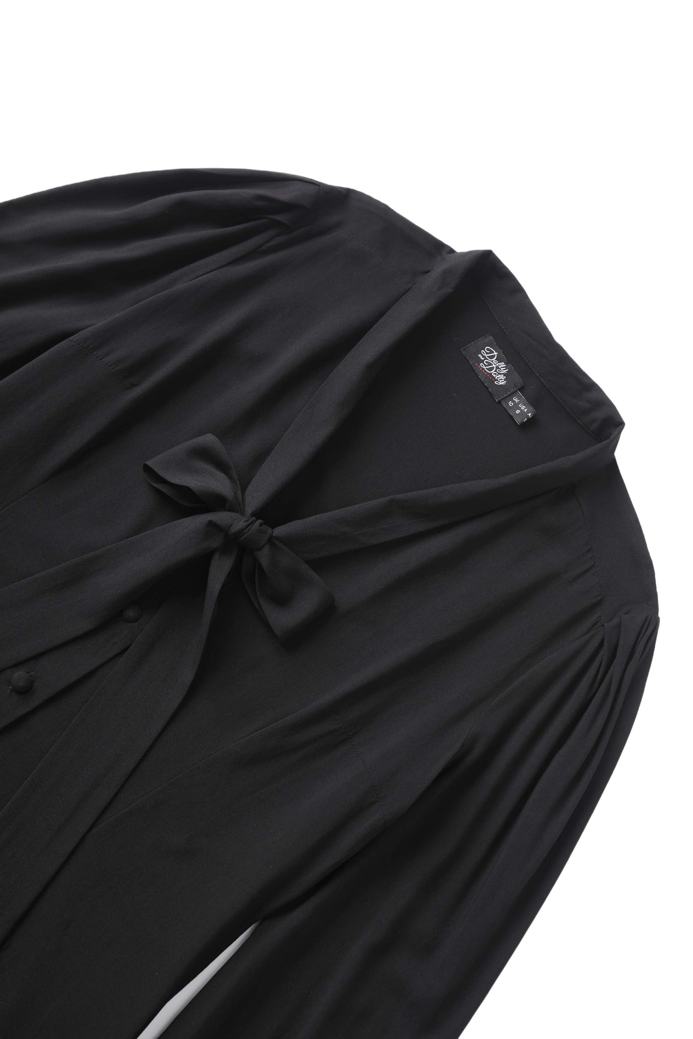 Close up view the collar of Margaret Long Sleeved Blouse In Black