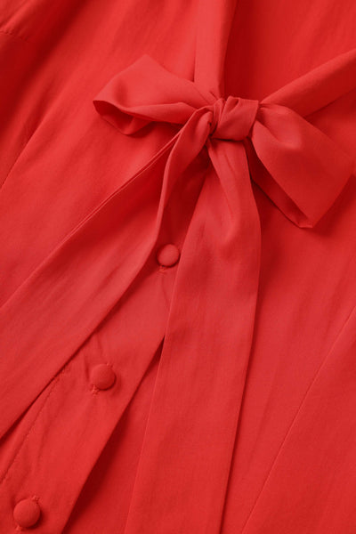 A bow tie collar of Margaret Long Sleeved Blouse In Red