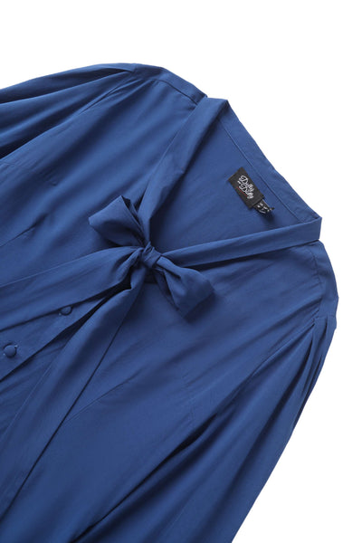 Close up view the neckline of Margaret Long Sleeved Blouse In Royal Blue