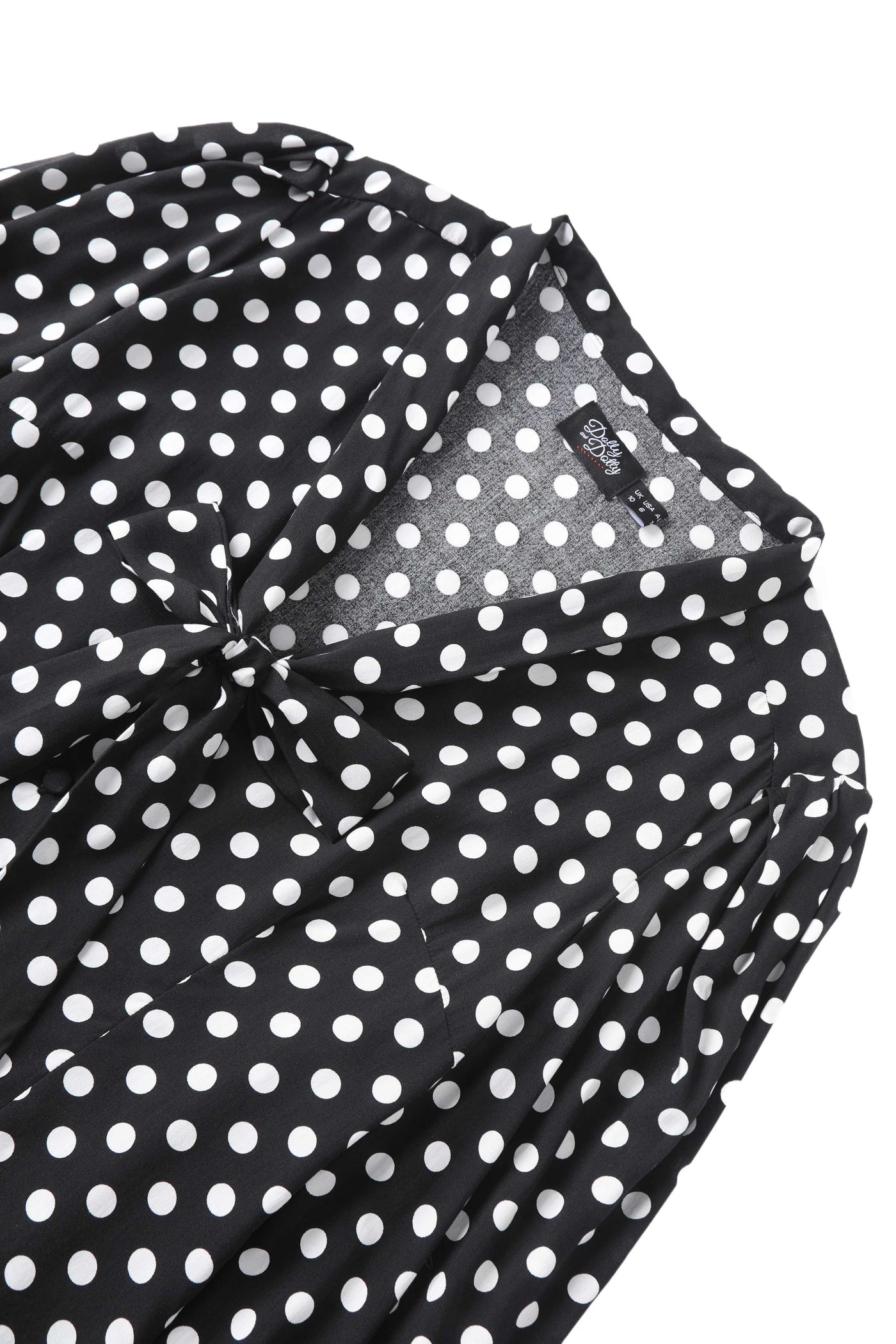 Close up view the collar of Margaret Polka Dot Long Sleeved Blouse In Black