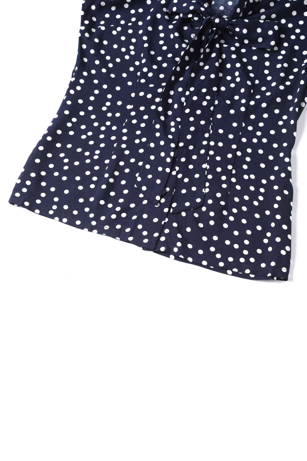 Close up view of Margaret Polka Dot Long Sleeved Blouse In Dark Blue
