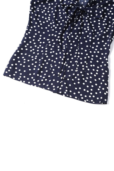 Close up view of Margaret Polka Dot Long Sleeved Blouse In Dark Blue