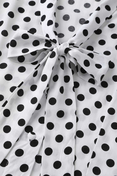 A bow tie collar of Margaret Polka Dot Long Sleeved Blouse In White