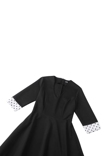 Close up view of Maria Black Circle Dress With Polka Dots