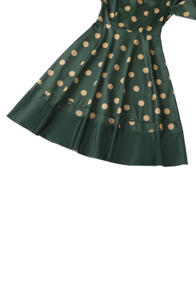 Close up view of Maria Green Circle Dress With Polka Dots