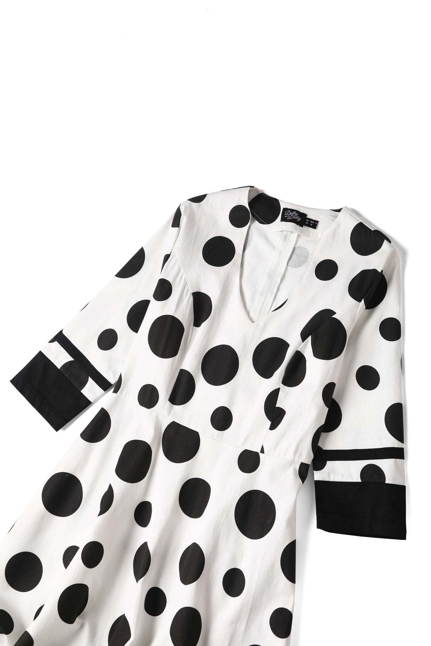 Close up view of Maria White Circle Dress With Polka Dots