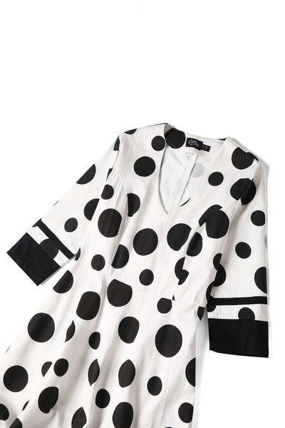 Close up view of Maria White Circle Dress With Polka Dots