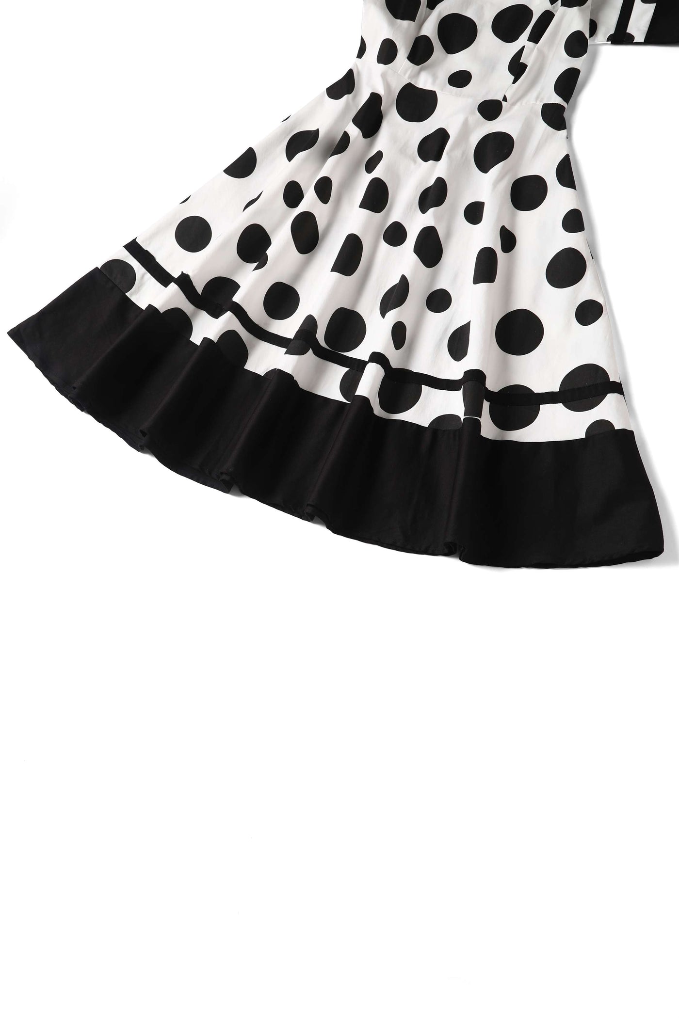 Close up view of Maria White Circle Dress With Polka Dots