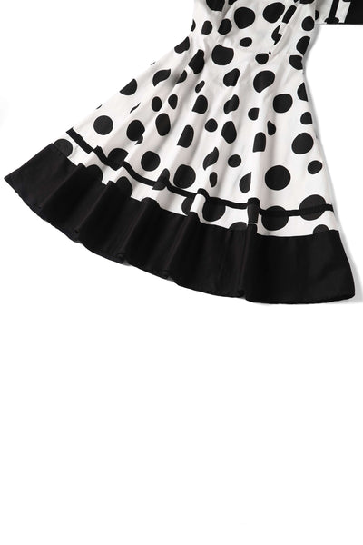 Close up view of Maria White Circle Dress With Polka Dots