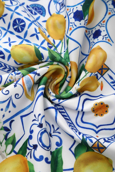 Close up view of Mediterranean Lemon Off Shoulder Dress