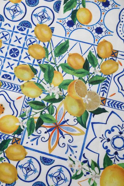 Close up view of Mediterranean Lemon Off Shoulder Dress