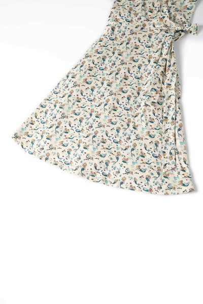Close up view of Mermaid Wrap Dress In Ivory