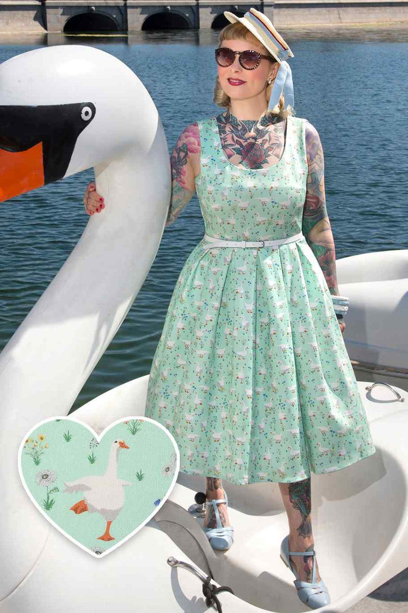 A model wearing a Mint Green Duck Swing Dress