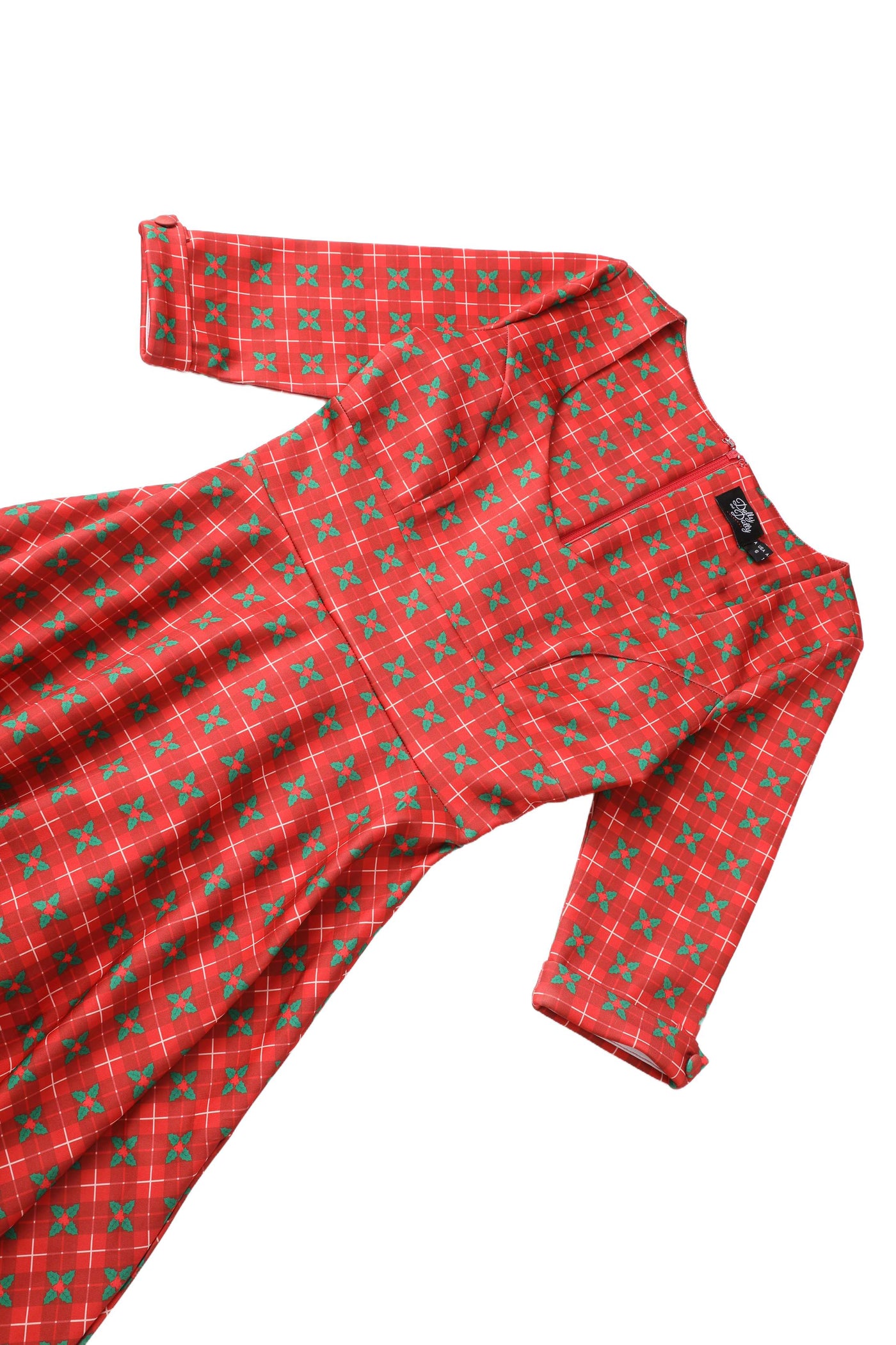 Close up view of Mistletoe Plaid Midi Dress
