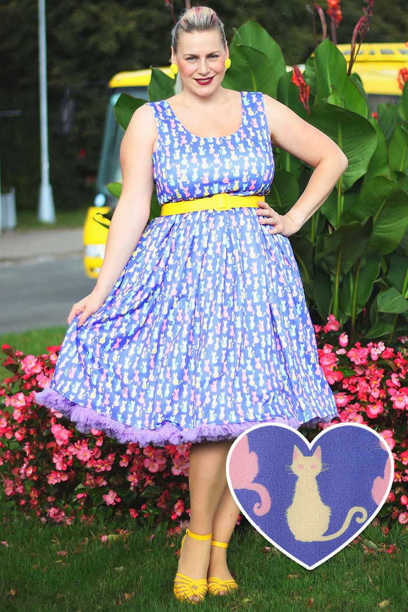 A lady wearing an Amanda Multicoloured Cat Swing Dress