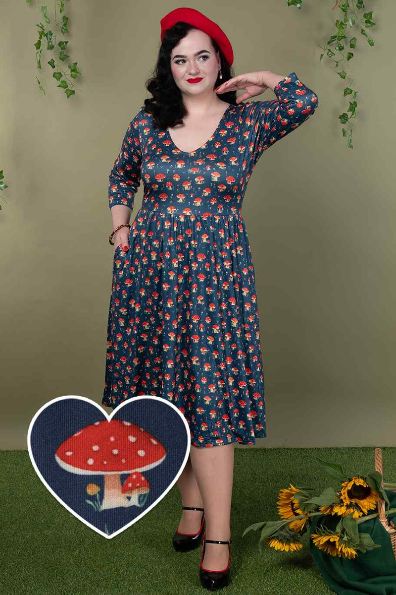 A lady wearing a Mushroom Long Sleeved Dress