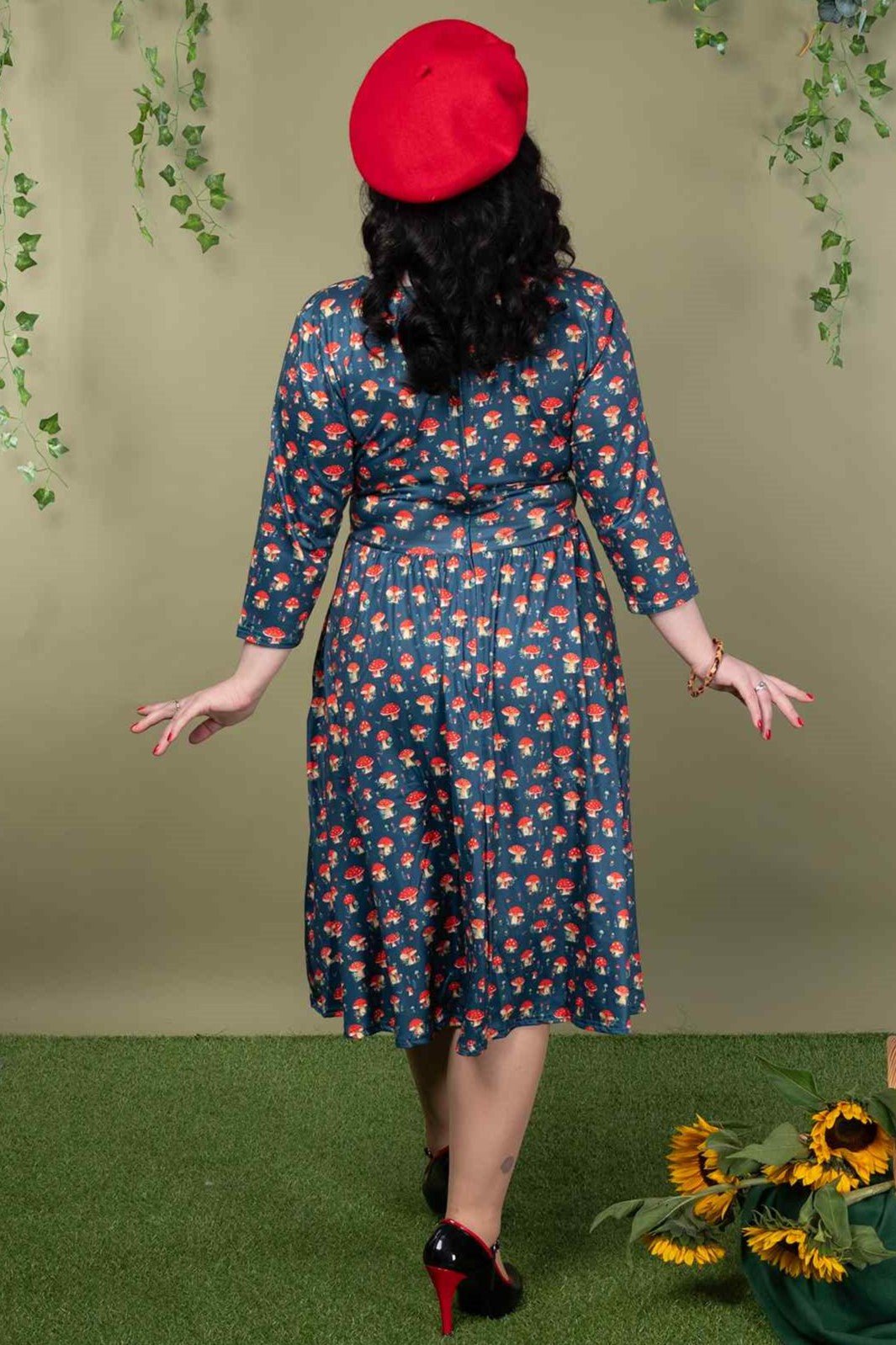 A lady wearing a Mushroom Long Sleeved Dress