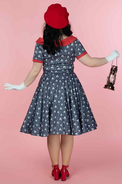 A model wearing a Nautical Sailboat Off Shoulder Dress