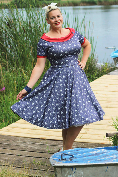 A model wearing a Nautical Sailboat Off Shoulder Dress
