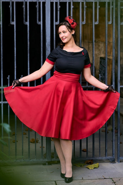 A graceful model wearing a Navy & Burgundy Swing Dress