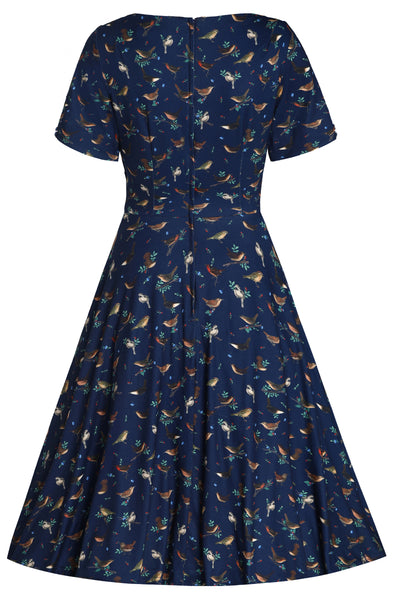 Back view of navy blue bird print sleeved swing dress