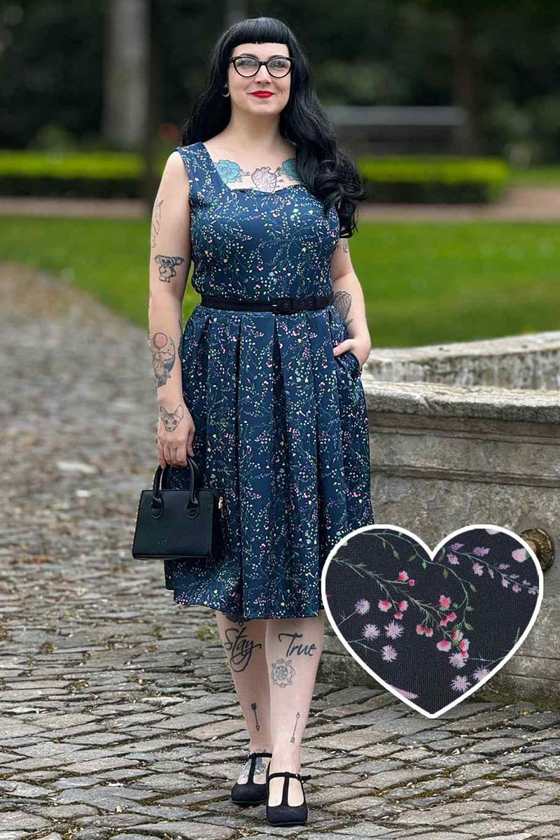 A model wearing Navy Blue Meadow Dress